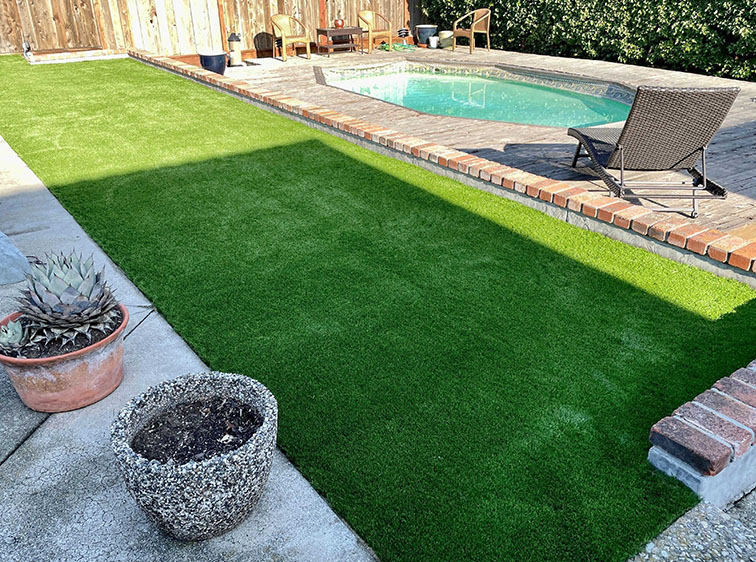 Can Artificial Turf in Modesto Around a Pool Help in Preventing Soil Erosion?