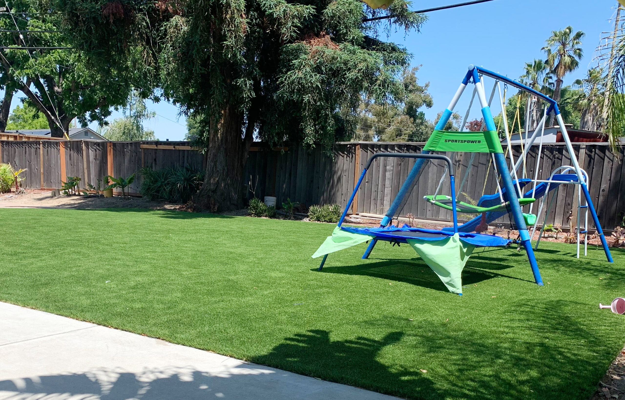 outdoor swing for artificial grass play area