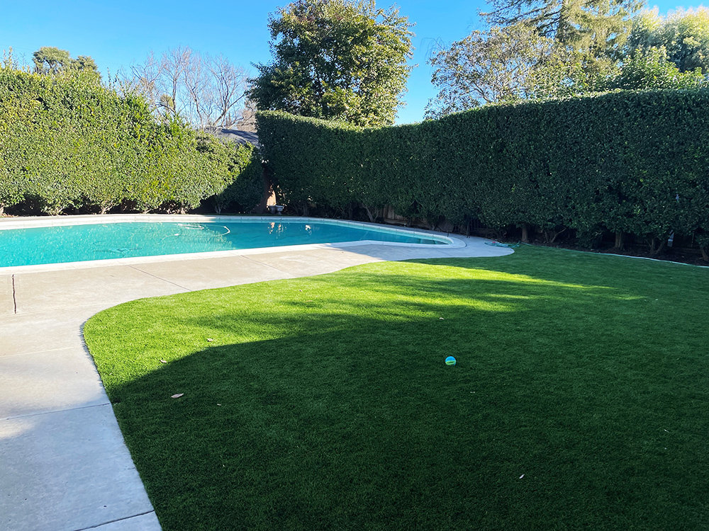 How to Incorporate Artificial Grass into Your Pool Area Design