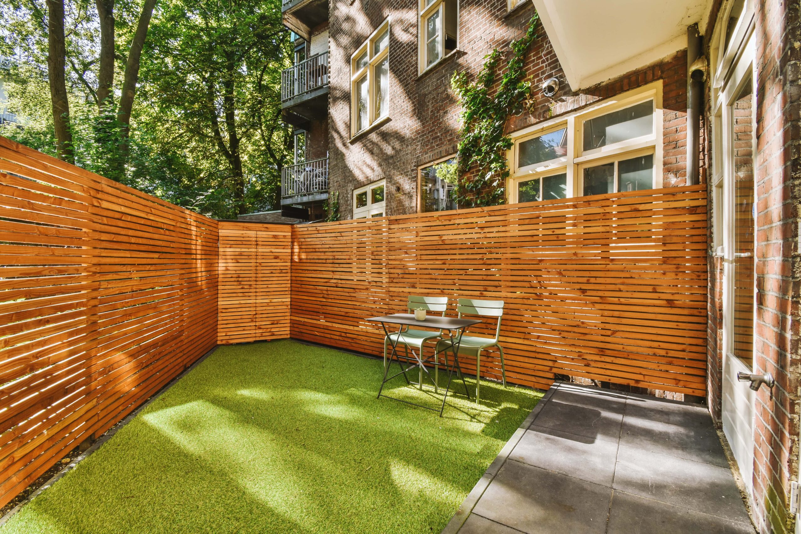 Modern backyard makeover with artificial grass for residential homes